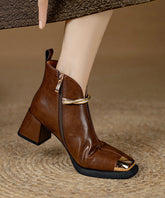 Botines elegantes de tacón grueso con empalme en piel de vacuno negra